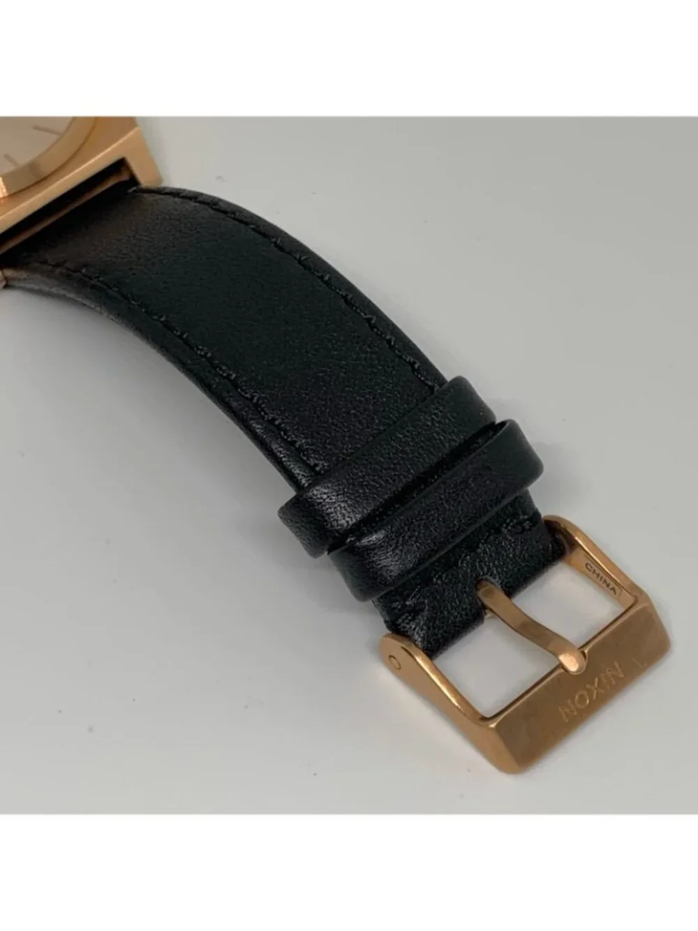Nixon The Time Teller Minimal men’s watch Rose Gold tone Dial Case 37mm running